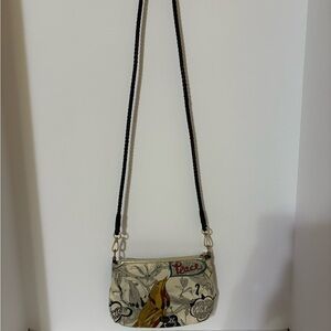 Sakroots crossbody bag.